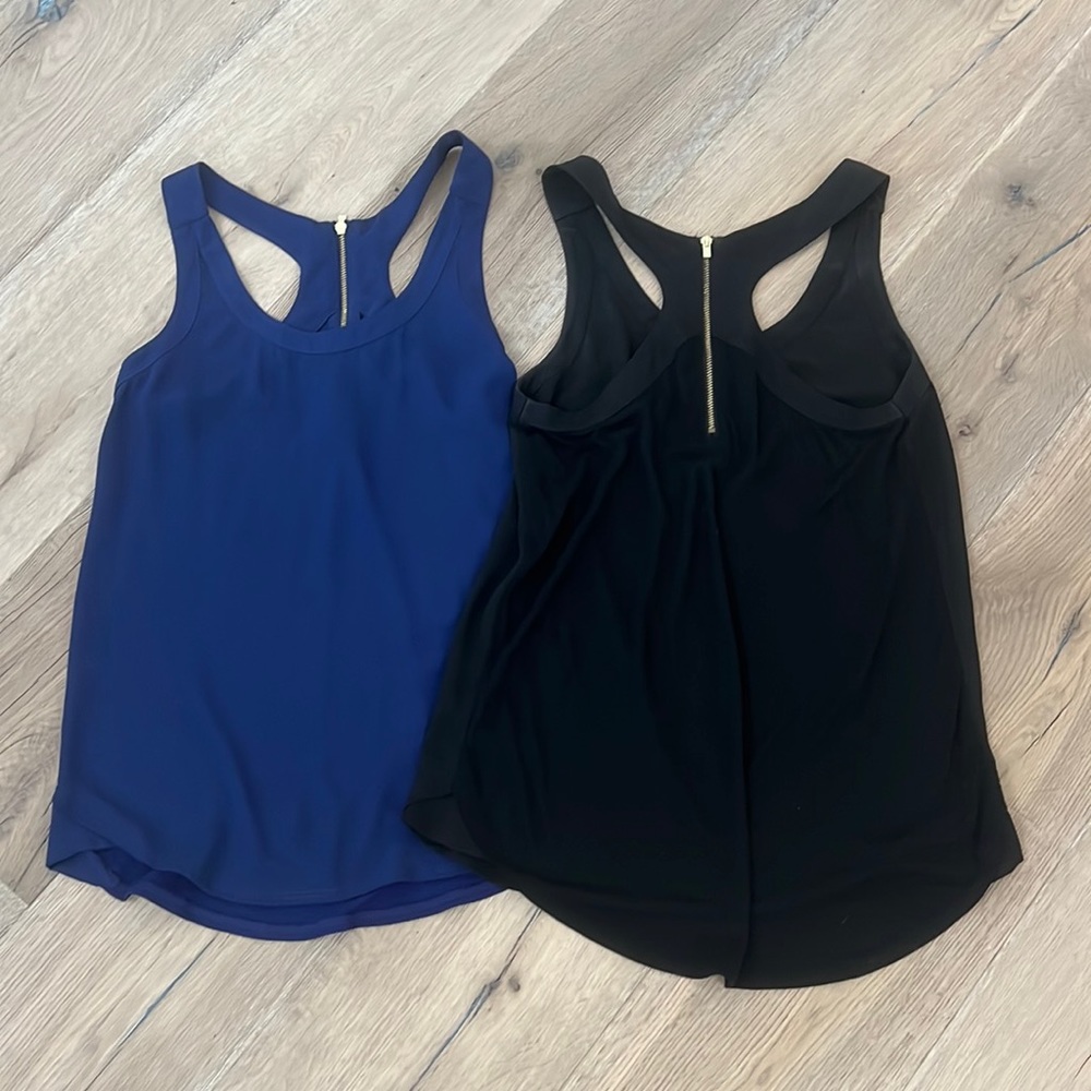 2 Express sleeveless blouses
